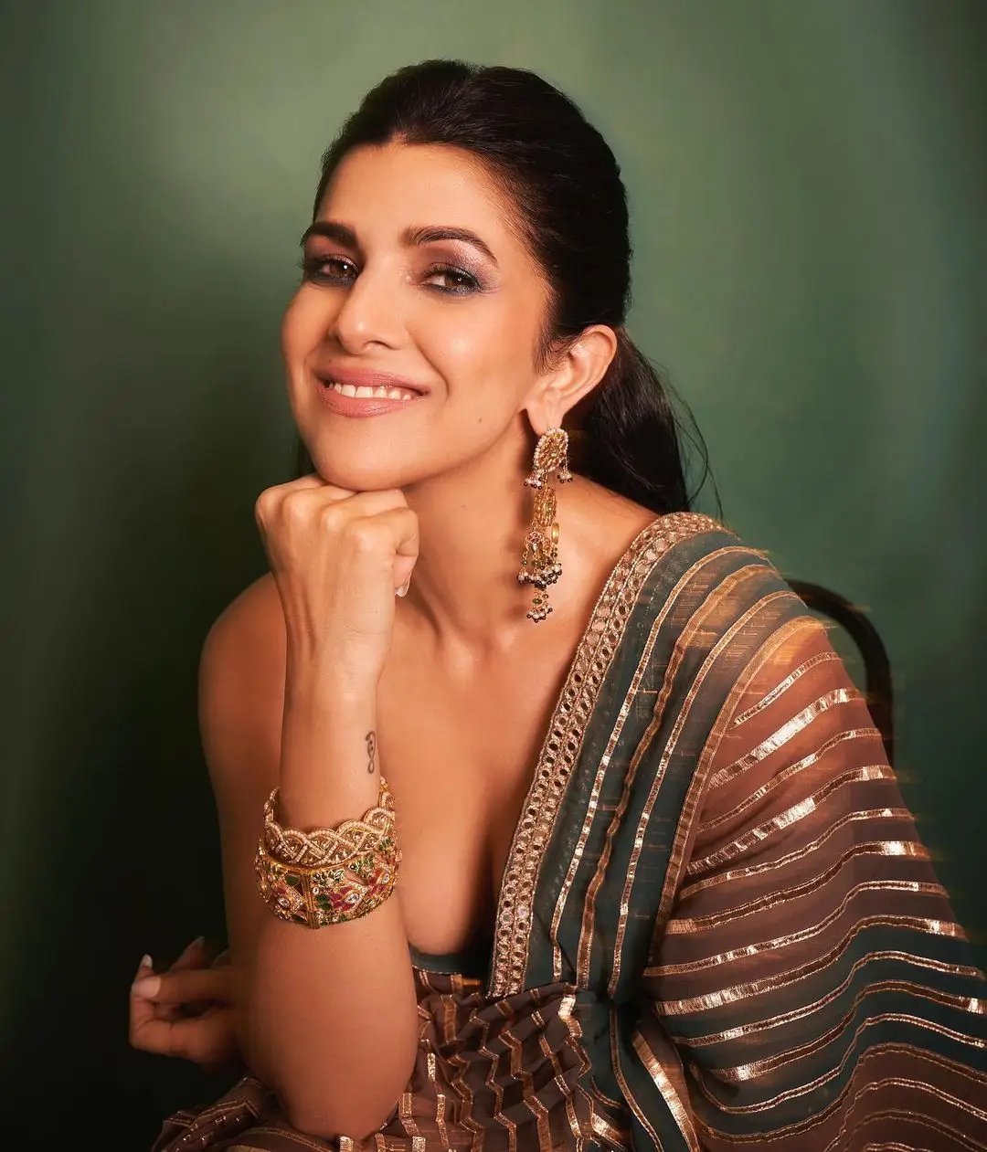 Bollywood Actress Nimrat Kaur Stills In Maroon Saree